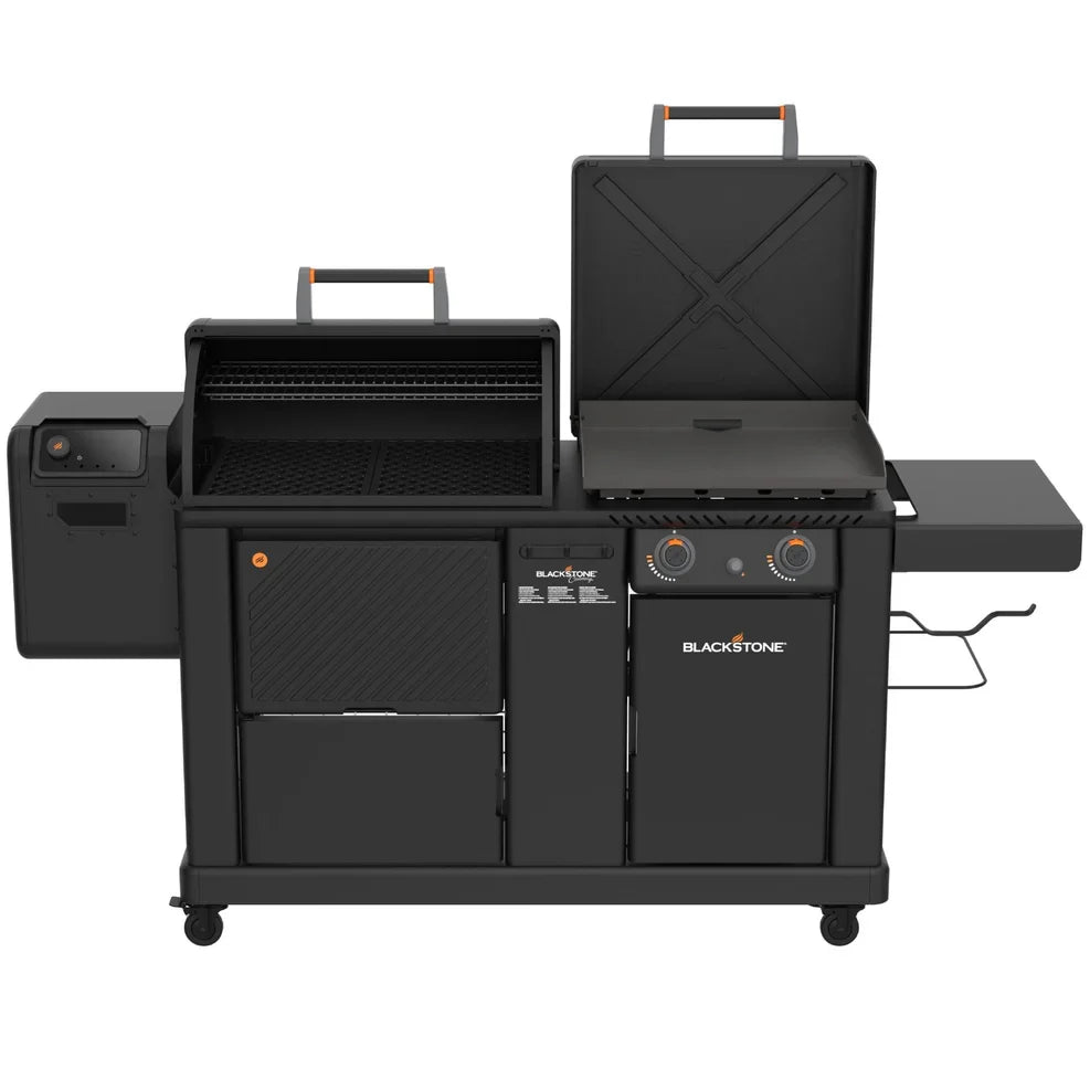 Blackstone dual fuel outdoor grill with a side burner, main grill chamber with lid open, lower storage cabinets, and side table on a white background.