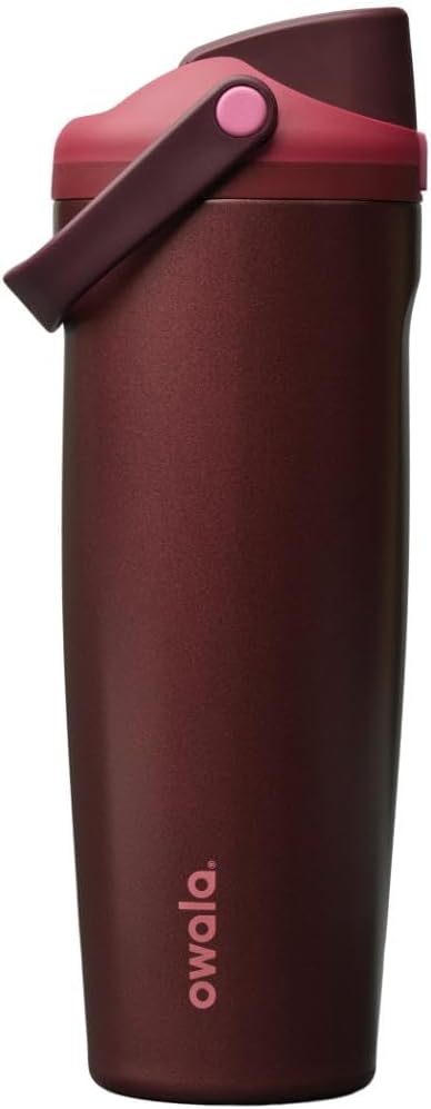 A Owala insulated travel tumbler in a deep burgundy color, featuring a matching burgundy flip-top lid with a pink accent button and a pink Owala logo near the bottom.