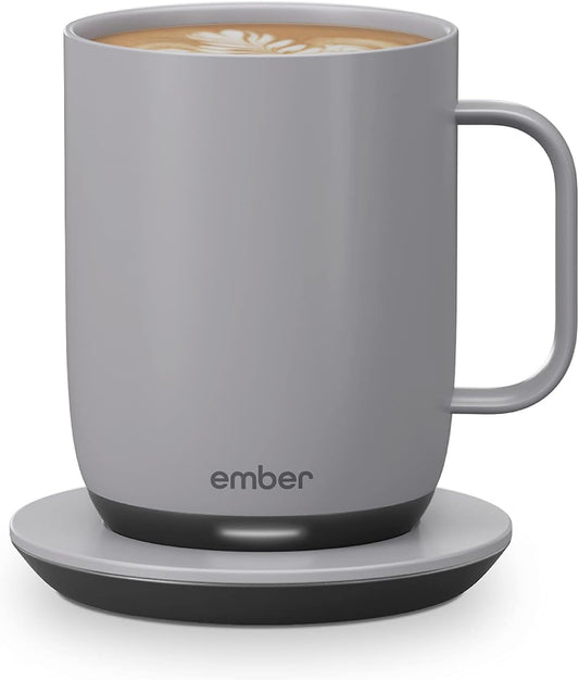 Gray Ember mug with a cup of coffee on a white background