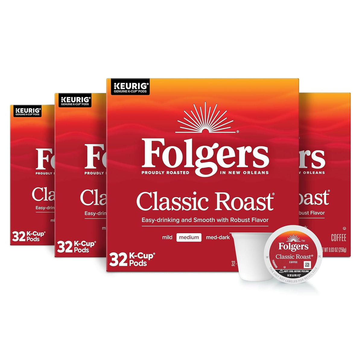 Four 32-count boxes of Folgers Classic Roast medium roast K-Cup coffee pods with two pods in front, 128 count total.