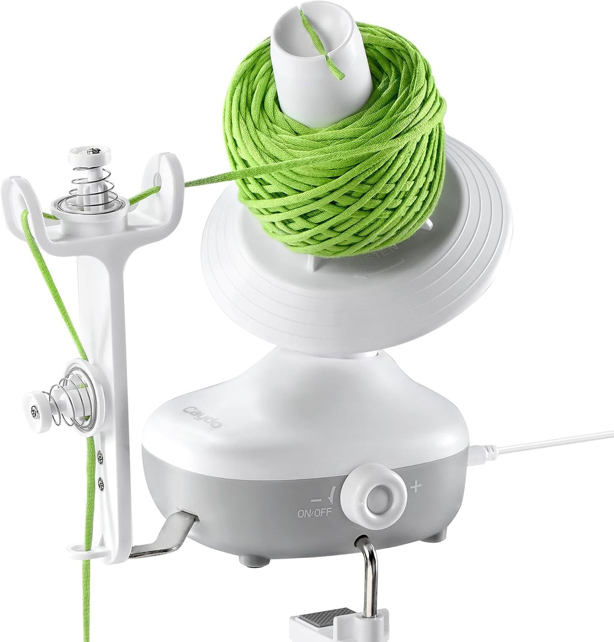 White Caydo M1 electric yarn winder with green yarn cake, spring tension guides and speed control dial