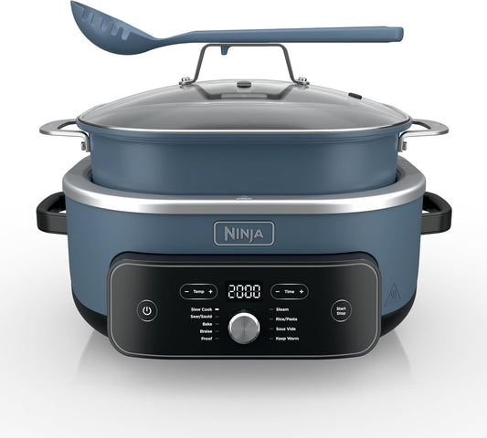 Ninja multi-cooker with a blue ladle on a white background