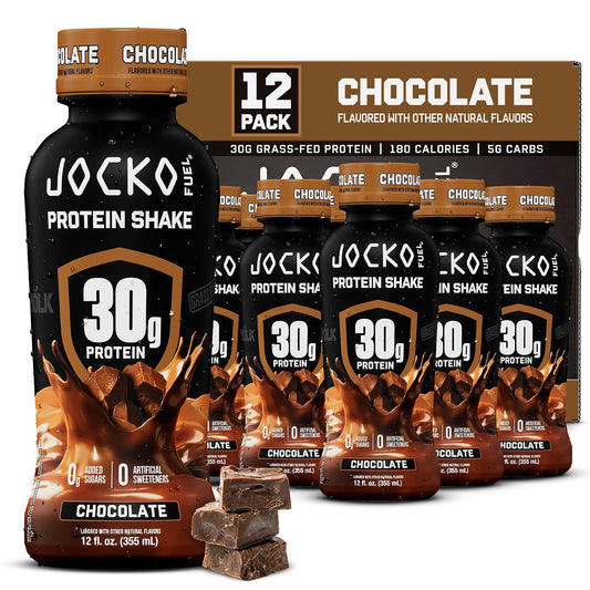 A 12-pack box of Jocko Fuel Protein Shake in Chocolate flavor, featuring a large bottle in front of four smaller bottles and two chocolate pieces on a clean white background.
